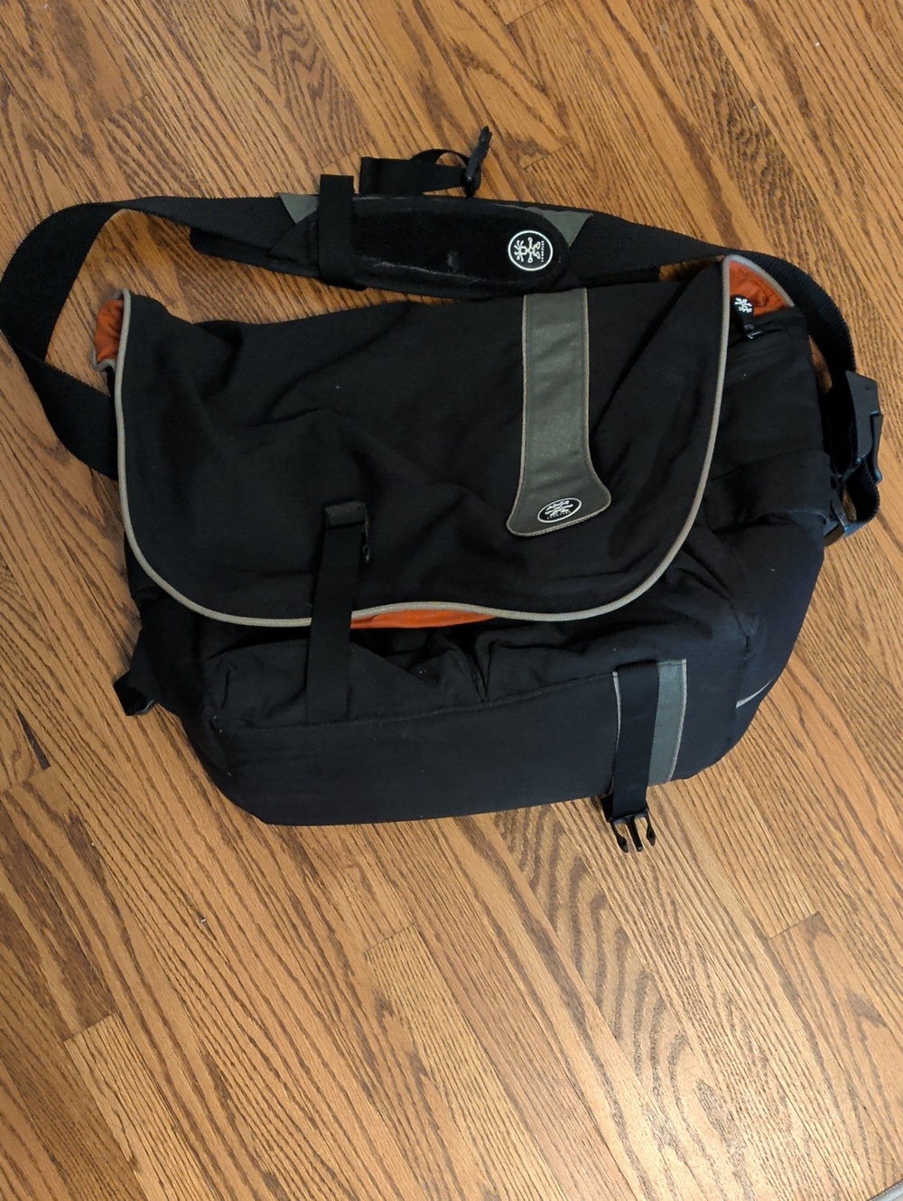 Black Crisp Suit Messenger Bag with Orange Lining and Reflective Trim